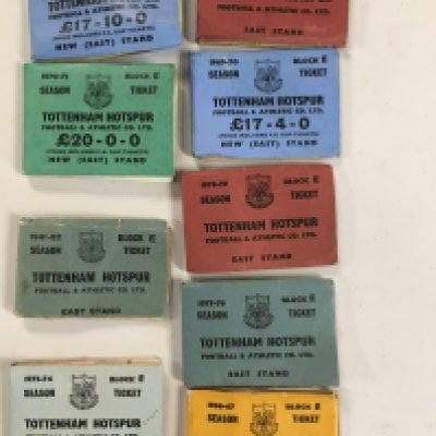 Tottenham Football Memorabilia Box: Includes season ticket books for 66/67 67/68 69/70 70/71 73/74 77/78 78/79 80/81 + 81/82. 4 home programmes from mid 50s, Signed book Tottenham Dream Team x 8, Signed picture of Greaves Smith and Jones celebrating in changing room and a box of 80s and 90s programmes.