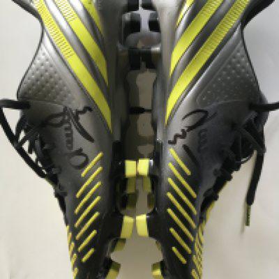 Leighton Baines Everton Signed Football Boots: Adidas Predator grey boots with yellow design and studs. Given to vendor directly by Baines who has signed both boots. Whilst excellent they have been worn but Leighton did not specify if he wore them in a match so will be sold as player issue. U.K. size 6.5.