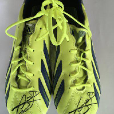 Gareth Bale Tottenham Match Issued Signed Football Boots: Adidas F50 green and blue Adizero boots issued to Bale in 2013 but not worn as they are unused. Both boots signed with his number 11 autograph. Picture of him wearing this style boots online.