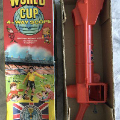 1966 Football World Cup Boxed Kids Telescope: Rare chance to obtain the red 4 way scope in original box which features WC Willie and the tournament logo.