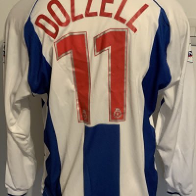 Colchester United 2001 - 2002 Match Worn Football Shirt: Blue long sleeve with Nationwide badging to arms. Number 11 Dozzell to rear.
