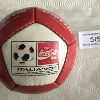 1990 Football World Cup Coca Cola Shop Promotion Memorabilia: A small ball with Coca Cola and Italia 90 logo along with unused large stickers for Fanta Lilt and two different Coca Cola with backing still attached. Stickers are from the period and not related to World Cup.