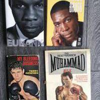 Boxing Memorabilia Box: Signed undedicated hardback books by Eubank Bruno a dedicated autograph by Downes and a signed fdc by Henry Cooper. Was of programmes to include a few Bruno plus Magri Kaylor some magazines and more.