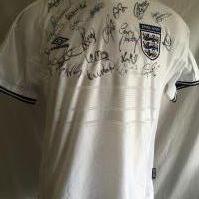 England 2000 Signed Football Shirt: Unused original shirt from 2000 signed by around 20 players including manager for the last ever England match at Wembley Keegan and current manager Southgate. Genuine autographs also from Rio Ferdinand Gary Neville Tony Adams Steve Gerrard and David Beckham.