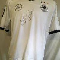 Hamann Germany Signed 2002 Football Shirt: Given to vendor directly by his friend Hamann. Could be a training top as has Mercedes logo to one breast and the usual Adidas logo has moved to the middle with German badge and 3 coloured stars to other breast. Signed clearly without dedication to front by the last goalscorer at Wembley. Inner mesh attached.