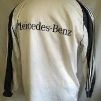 Hamann Germany Signed 2000 Football Shirt: Given to vendor directly by his friend Hamann. Could be a training top as has Mercedes logo to one breast and the usual Adidas logo has moved to the middle with German badge and 3 coloured stars to other breast. Signed clearly without dedication to front by the last goalscorer at Wembley. Slight stain.