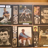 West Ham 1940s 1950s 1960s Football Autograph Collection: Stunning private collection all pre 1970 from various publications. All signatures are identified and laid down with photo corners on 12 x 12 inch card and easily removable. 54 pages to include 1 fully signed team group, 11 signed trade cards including large Typhoo Tea cards signed by Bobby Moore, Martin Peters & Geoff Hurst, 5 signed autograph pages, 13 signed original press photos and 214 various sized pictures to include 29 A4. 105 different player signatures including Bobby Moore x 6, Ron Brett, Len Goulden, Steve D'eath, Brian Dear, Alan Sealey, Noel Cantwell, Eddie Presland, Johnny Byrne, Billy Bonds, Ron Greenwood, John Charles, Malcolm Pyke etc. (350+)
