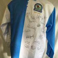 2000/2001 Blackburn 125th Anniversary Match Worn Football Shirt: Worn by Byornebye v Wolves who gave shirt directly to vendor. The white side of the very rare shirt is signed by 18 players including himself. Only ever worn once. Red number 3 to rear and with special permission no name, maker, sponsor or Premier League patches.