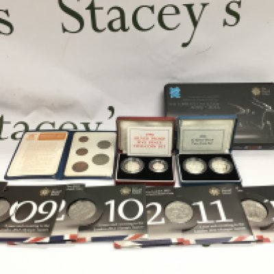 1989 silver proof coin set 1990 silver proof five pence coin set and the 2009 - 2012 countdown to London uncirculated coins. Postage B