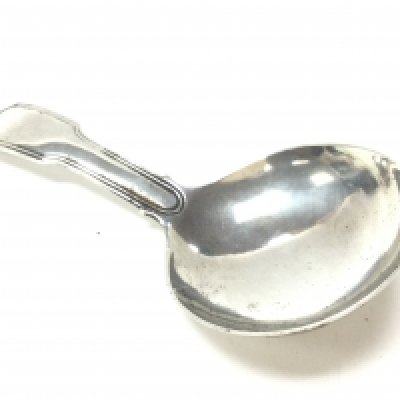 A Georgian silver caddy spoon. Postage category A