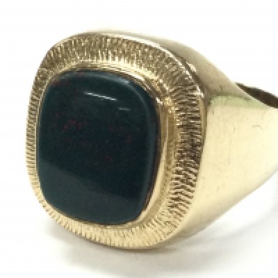 A 9 carat gold bloodstone signet ring , total weight 10.2g. Size Y. Postage category A