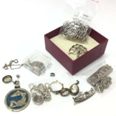 A small collection of silver jewellery including necklaces, bracelets. Postage category B