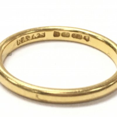A 22ct wedding band, size J. 2.4g. Postage category A