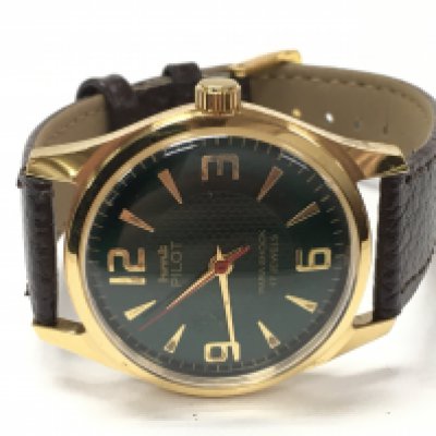 A HMT pilots Manual wind watch, 35mm case. Seen working. Postage category A