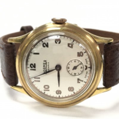 A vintage Dirty Dozen Style Roamer Manual wind watch, seen working. Postage cat a