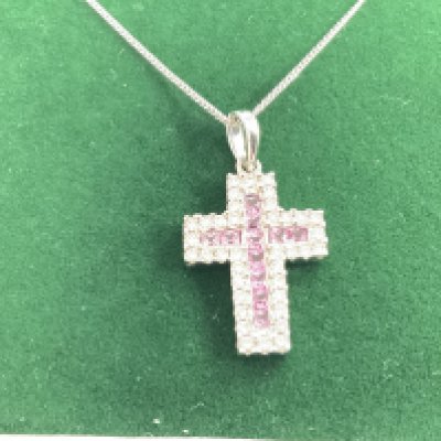 18ct white gold cross set with square cut pink sapphires and RBC DIAMONDS KN AN 18 ct white gold chain, boxed. Sapphires 0.30ct approx. Diamonds 1.00ct approx. Postage category A.