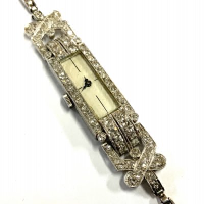 A 1930s Baume & Mercier platinum (unmarked tested) and diamond cocktail, Total weight 15.83g (A)