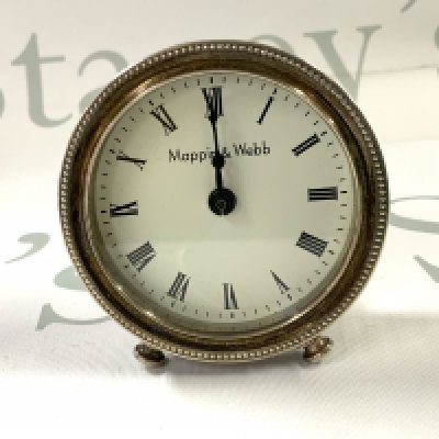 A hallmarked silver Mappin & Webb clock, 6.5cm Diameter. London 1990. (A)