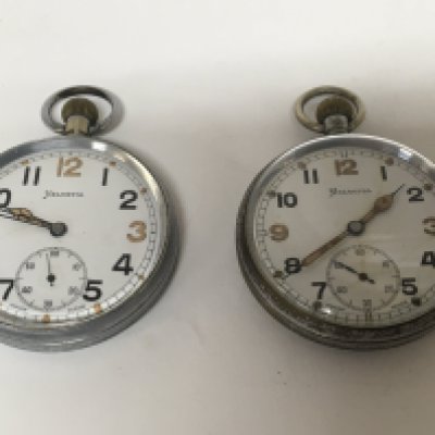 Two Military button wind pocket watches Swiss Made Helvetia both seen working. (2)