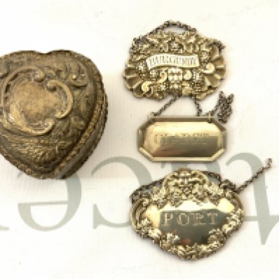 A small hallmarked silver heart shaped trinket box together with 3 good hallmarked silver wine labels (A)
