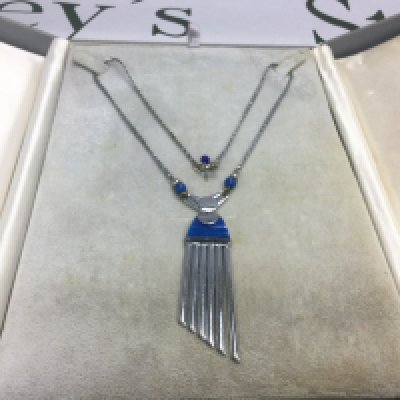 An Art Deco chrome necklace. Shipping category A.