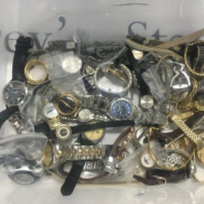 A plastic box of watches. Shipping category D.