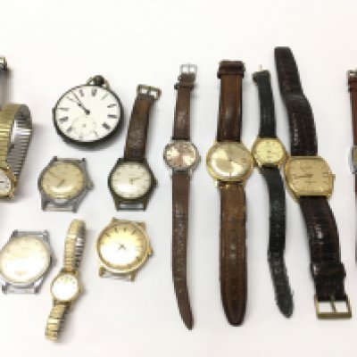 A collection of gents and ladies watches including a pocket watch. Postage B