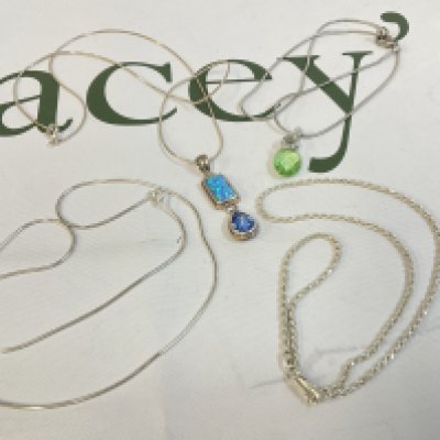 Four silver chains, postage category A