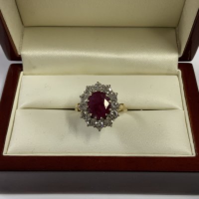Withdrawn -A good quality 18ct yellow gold Ruby and Diamond cluster ring central ruby surround by approx 1.2cts of brilliant cut diamonds. Size P (A)
