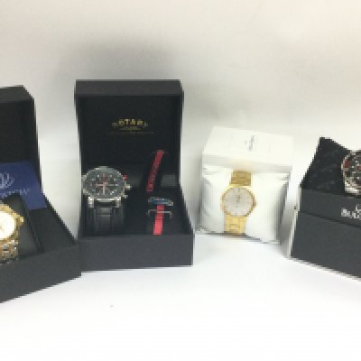 A collection of boxed watches including a Rotary 50 metres , two shillings coinwatch, Skagen, Bulova Marine Star. Postage category B