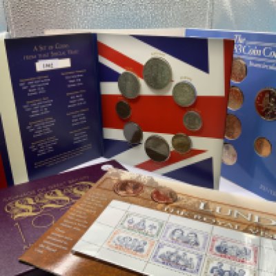 A small collection of presentation and proof coin collections. NO RESERVE