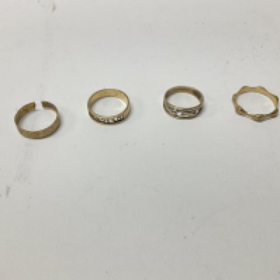 Four 9ct gold bands, approx weight 9.7 grams
