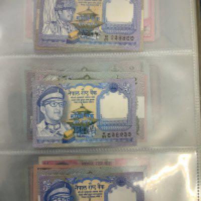 An extensive album of banknotes to inc Nepalese, Laos and Vietnamese banknotes. (B)