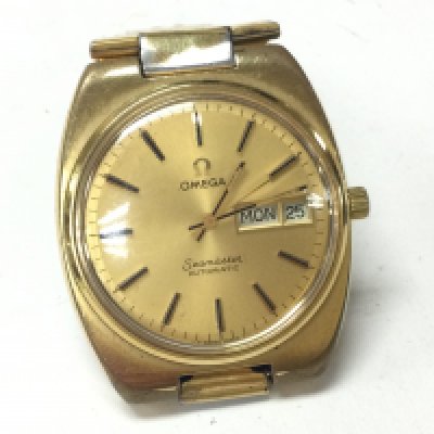 An Omega Seamaster day date automatic wrist watch. Circa 1978 gold plated. Cal 1020. Comes with omega box and outer dust box. Seen running. Postage B