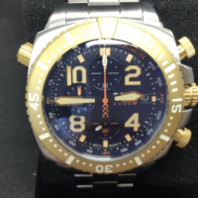 A RGMT automatic gents watch with box and papers. In as new condition seen running. Postage B