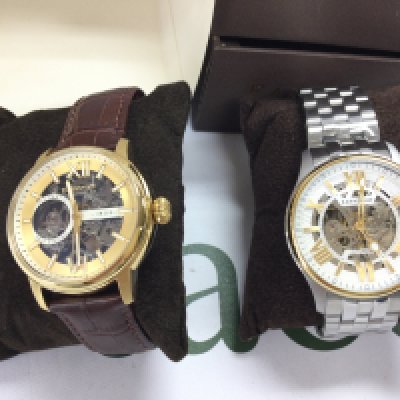 Two Earnshaw gents automatic watches both in excellent condition and seen running. Both with boxes (note one box damaged). Postage B