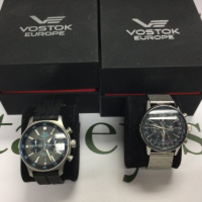 Two Vostok Europe gents watches with box and papers. Postage B