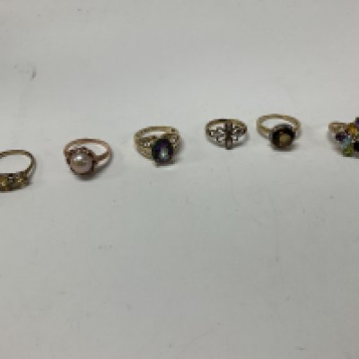 Six 9ct gold stone set rings, approx weight 19.38 grams.