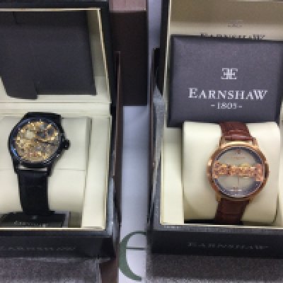 Two Earnshaw manual wind wrist watches with skeleton dials including boxes both seen running. Postage B