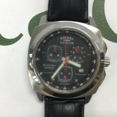 A Rotary evolution Chronograph watch on black leather strap. Postage B