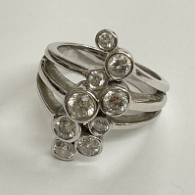 18ct gold 9 stone diamond rub over setting. 2ct. 8 grams. Ring size approx J. Postage category A.