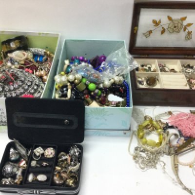 A large collection of assorted costume jewellery including rings necklaces bangles etc. Postage C