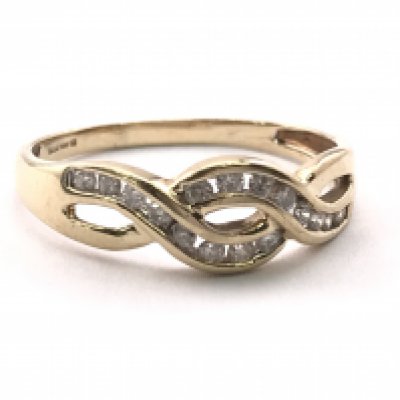A 9ct gold twist ring, inset with small diamonds. Ring size N/O. 1.95g Postage category A