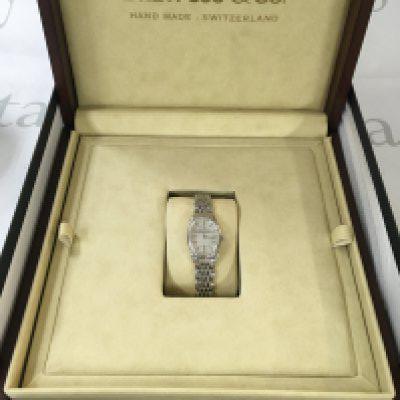 A boxed ladies dreyfusse & Co watch.