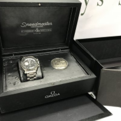 An Omega Speedmaster Apollo 11 40th anniversary limited edition watch with box and paperwork. 7259/7968. Postage category B