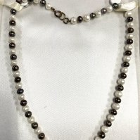 A multicoloured pearl necklace . (A)