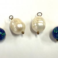 2 Baroque pearl pendants together with 2 14ct yellow gold and polished black opal beads (A)