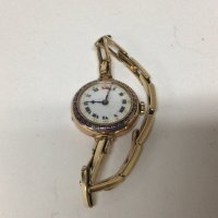 A Vintage 9carat gold ladies watch with an expanding Rolled Gold strap bracelet not seen working