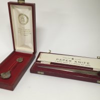A cased silver paper knife and a silver Jubilee commemorative spoon (2)
