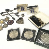 A Collection of silver hallmarked Southend and district football medals from circa 1920, free masons silver hallmarked match box holders and other assorted items. Postage category B